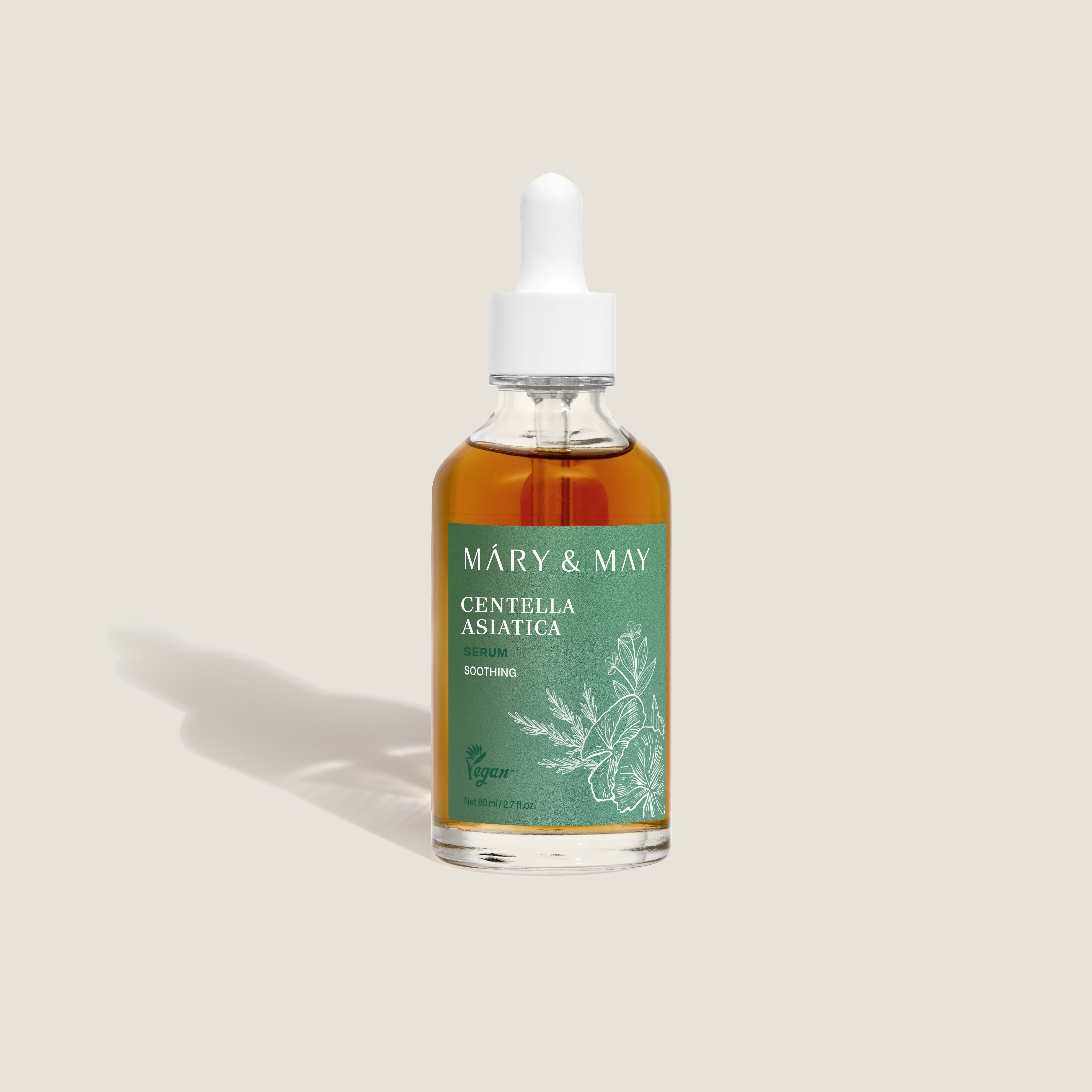 Mary&May Centella Asiatica Serum bottle held up to natural light