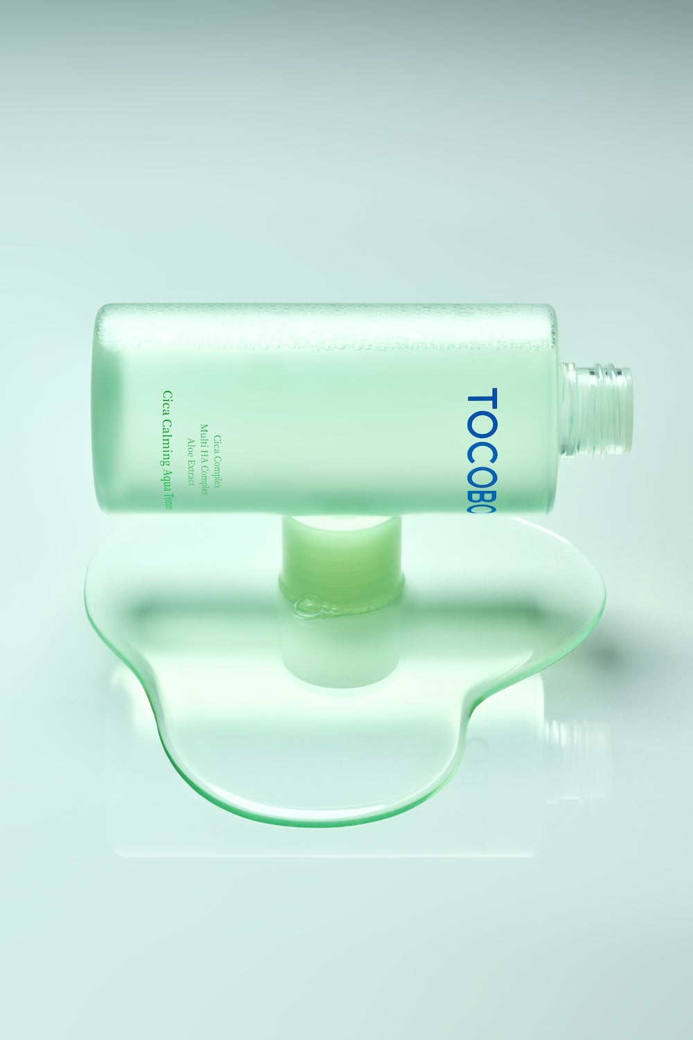 Tocobo Cica Calming Aqua Toner 200ml bottle held in hand