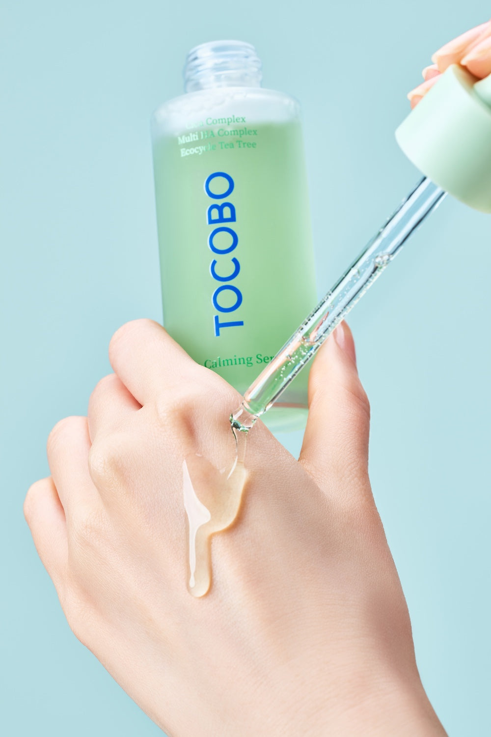 Tocobo Cica Calming Serum bottle next to toner