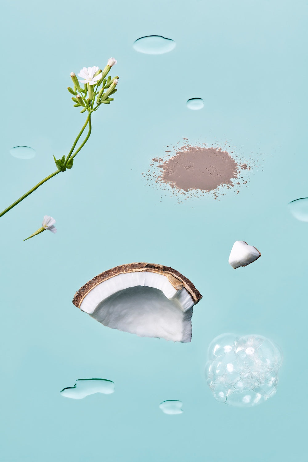Cleansing foam bubbles held in cupped hands