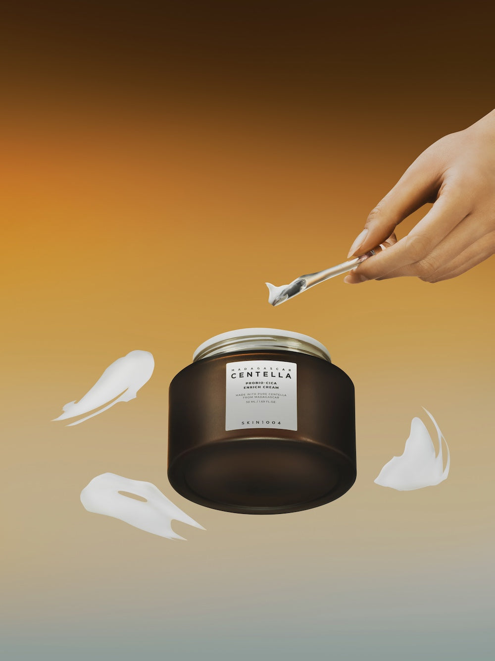 Enrich cream jar next to standard centella cream for comparison