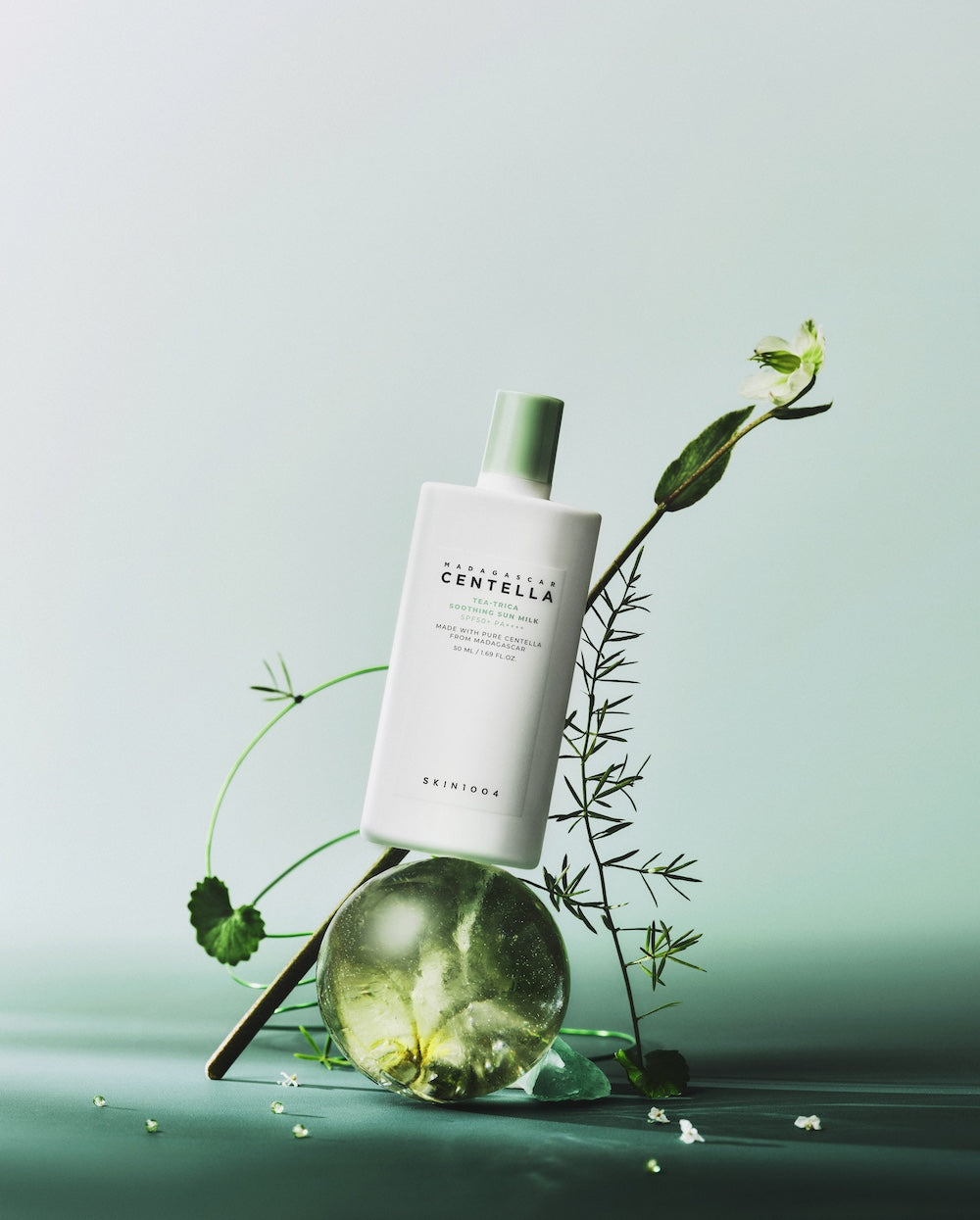 A thin, dewy layer of sun serum on bare skin