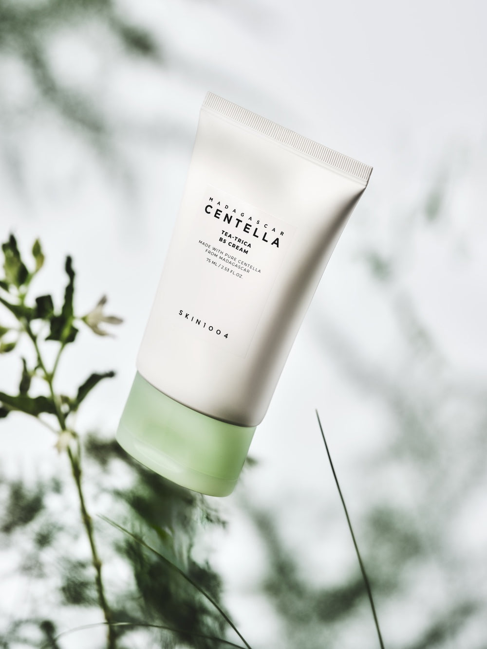 The gel cream being patted into the cheek during application