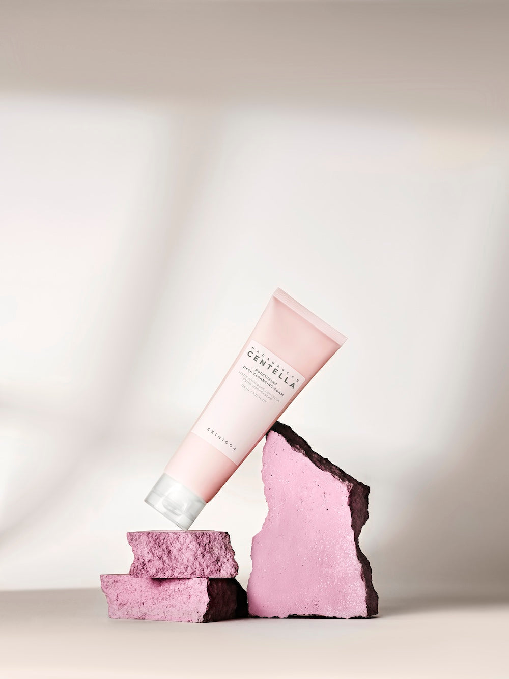 SKIN1004 Poremizing Deep Cleansing Foam tube held at an angle to show the label