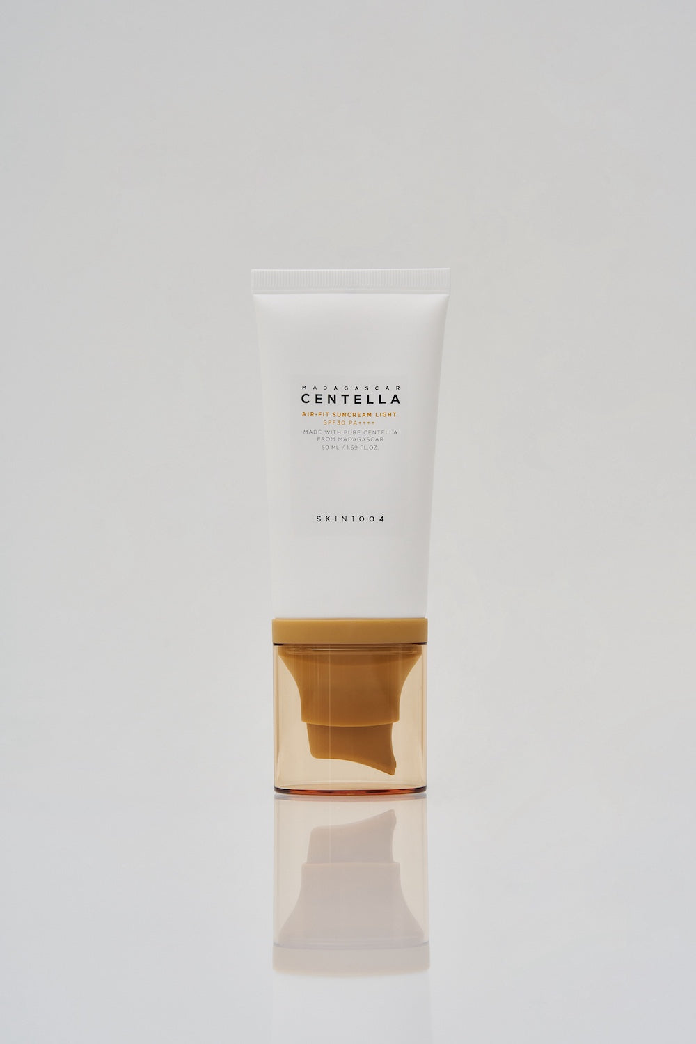 A macro shot of the serum absorbing with no white residue