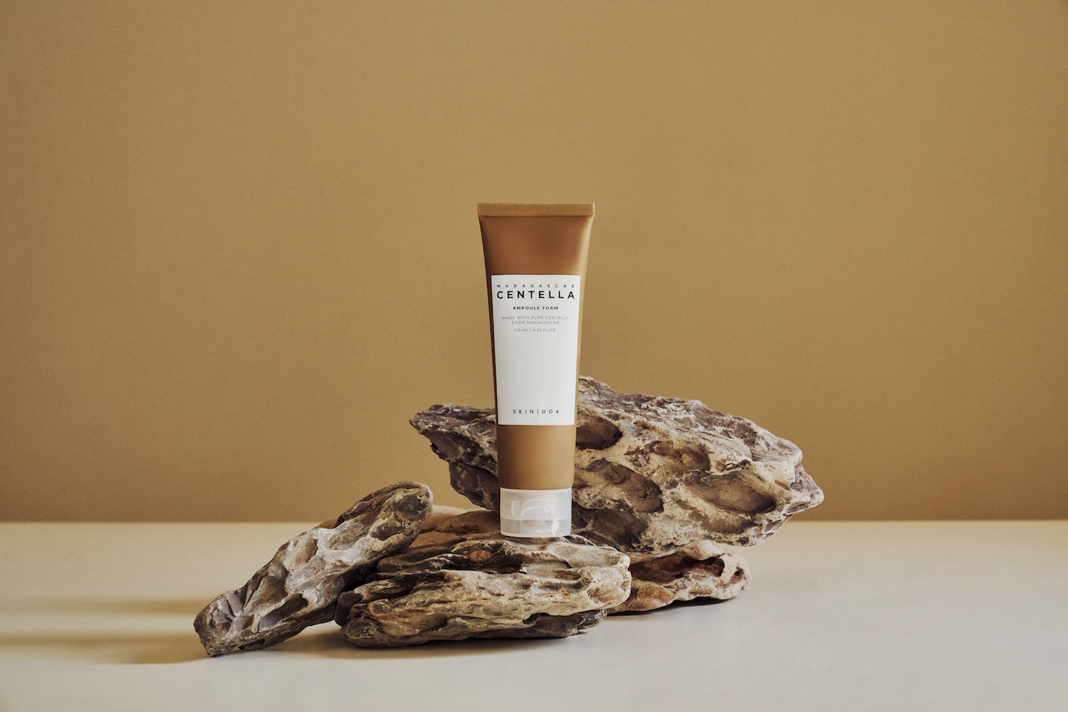 SKIN1004 Madagascar Centella Ampoule Foam carried in a small toiletry bag for travel
