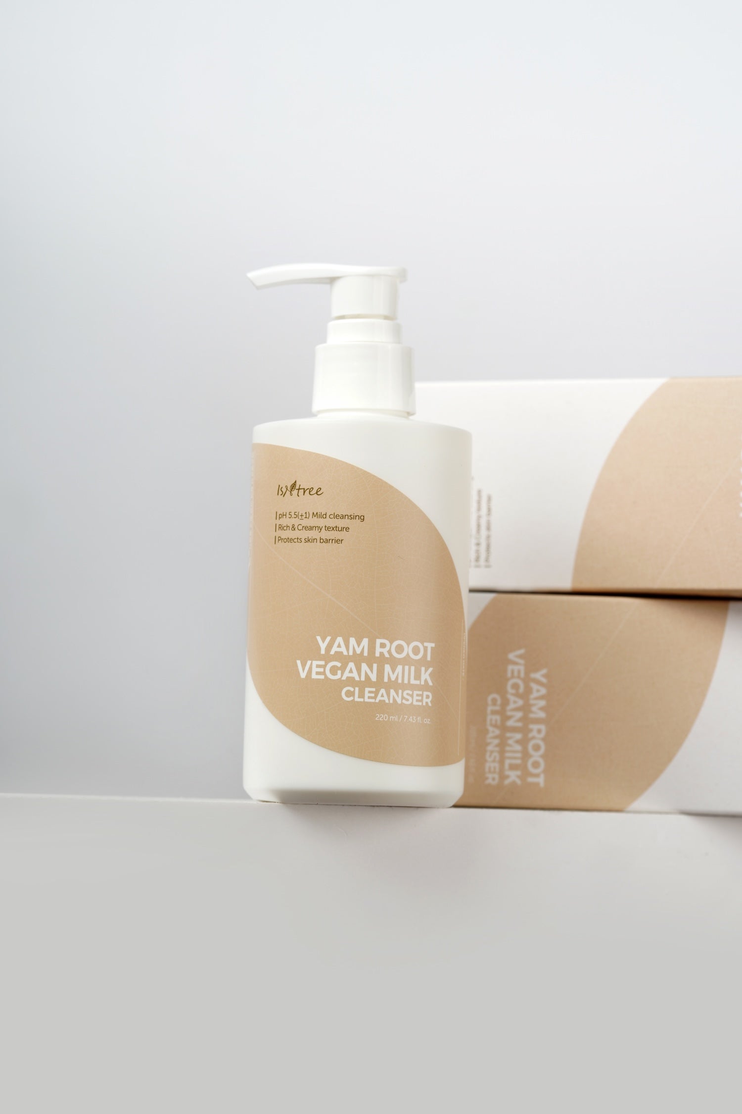 Isntree Yam Root Vegan Milk Cleanser being wiped away with cotton pad