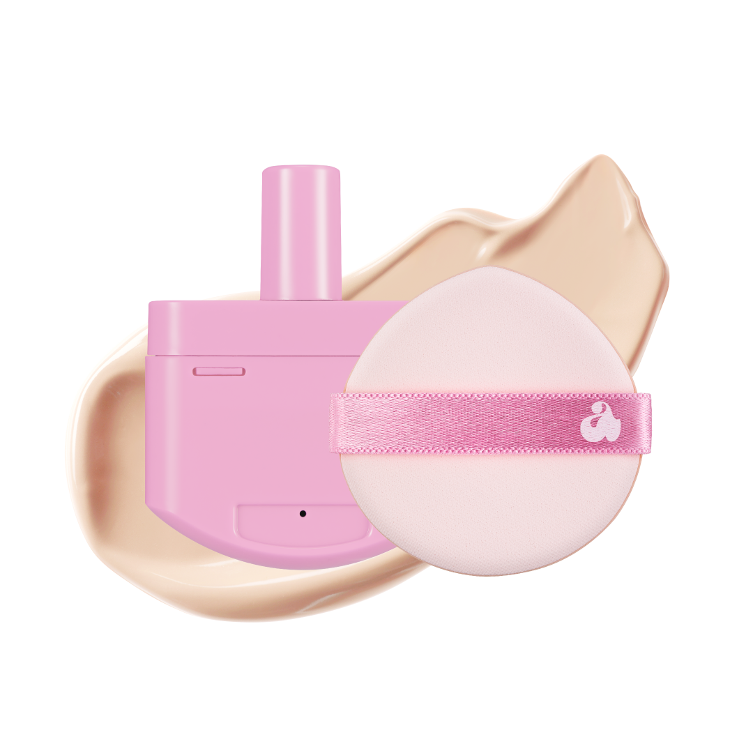 Cushion compact opened showing puff and mirror