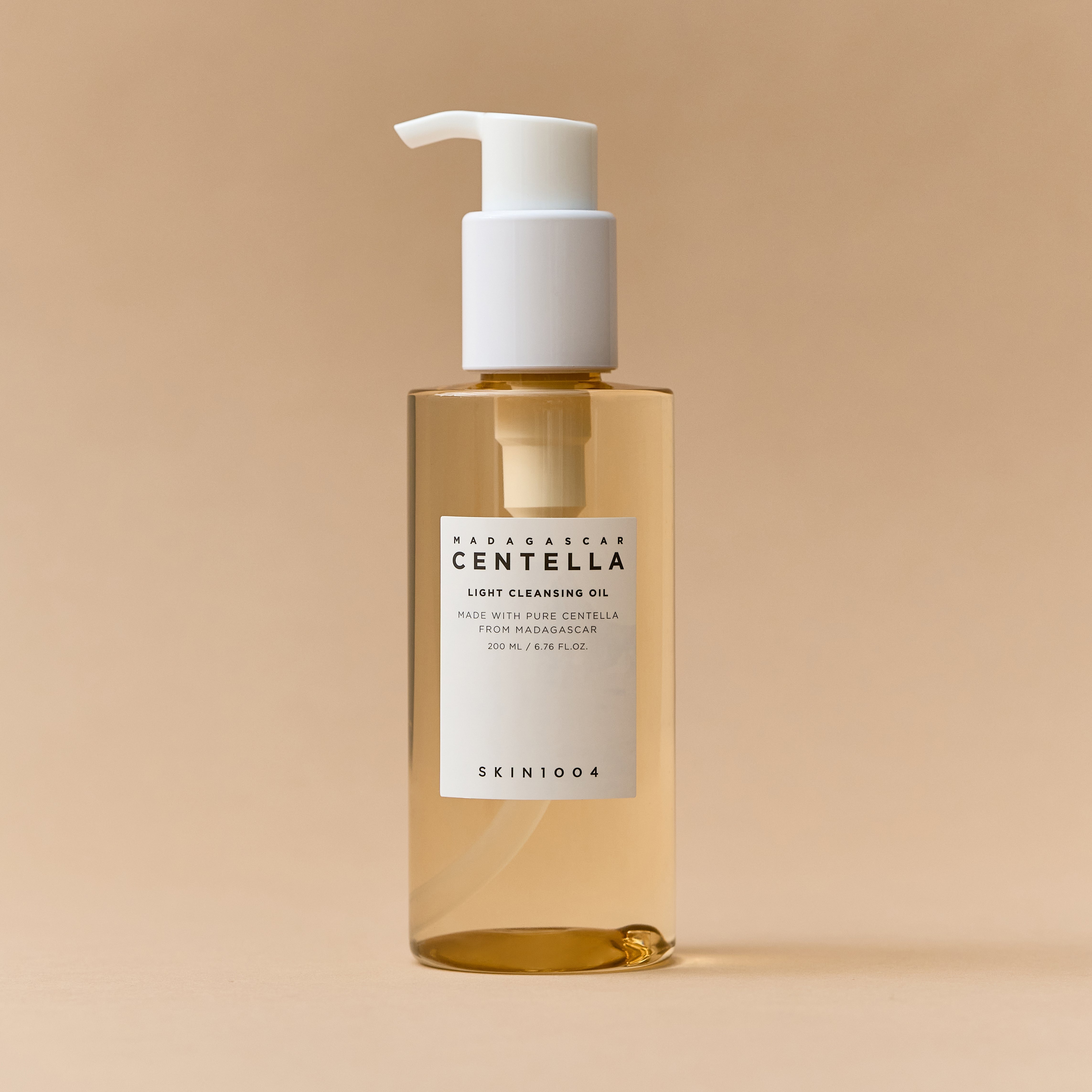 The cleansing oil being massaged into dry skin