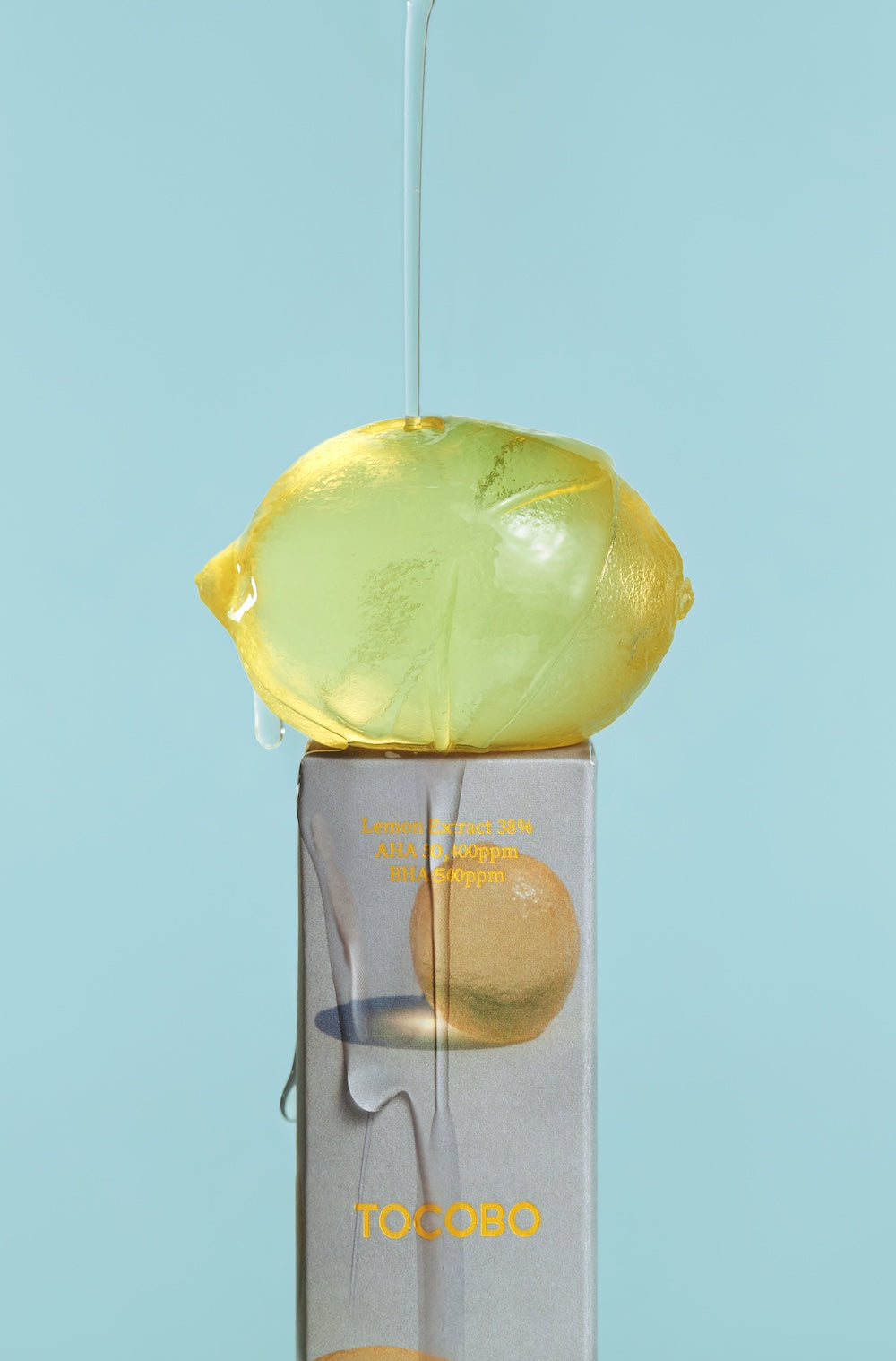 Toner bottle top-down view of lemon cap