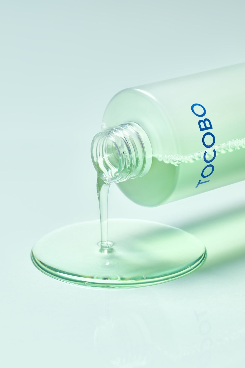 Tocobo Cica Calming Aqua Toner being patted onto skin