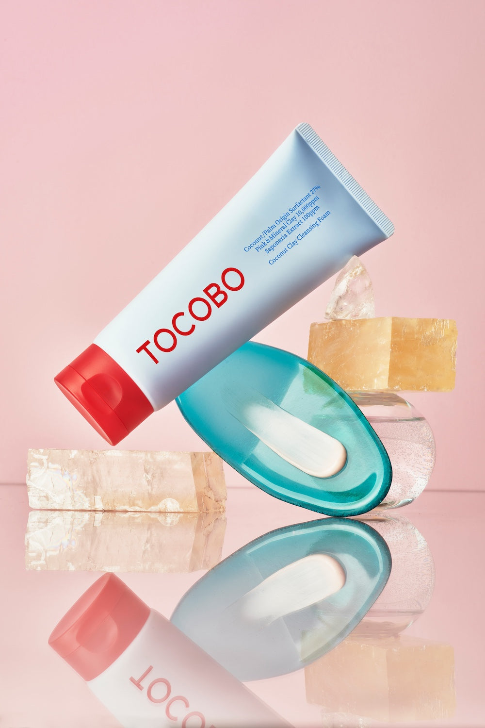 Cleansing foam tube and box together on table