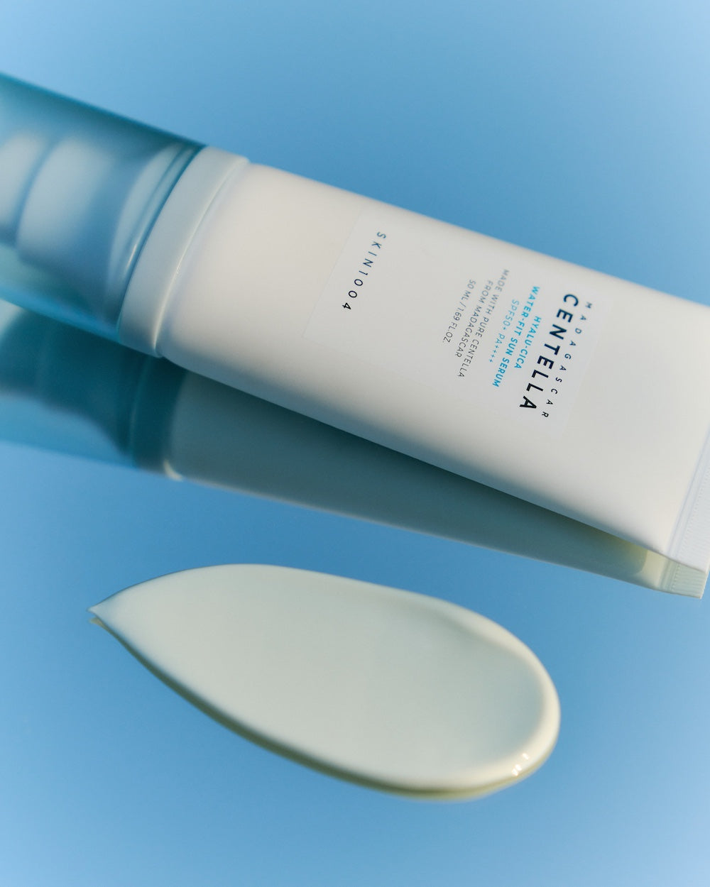 Sun serum bottle wrapped in packaging film