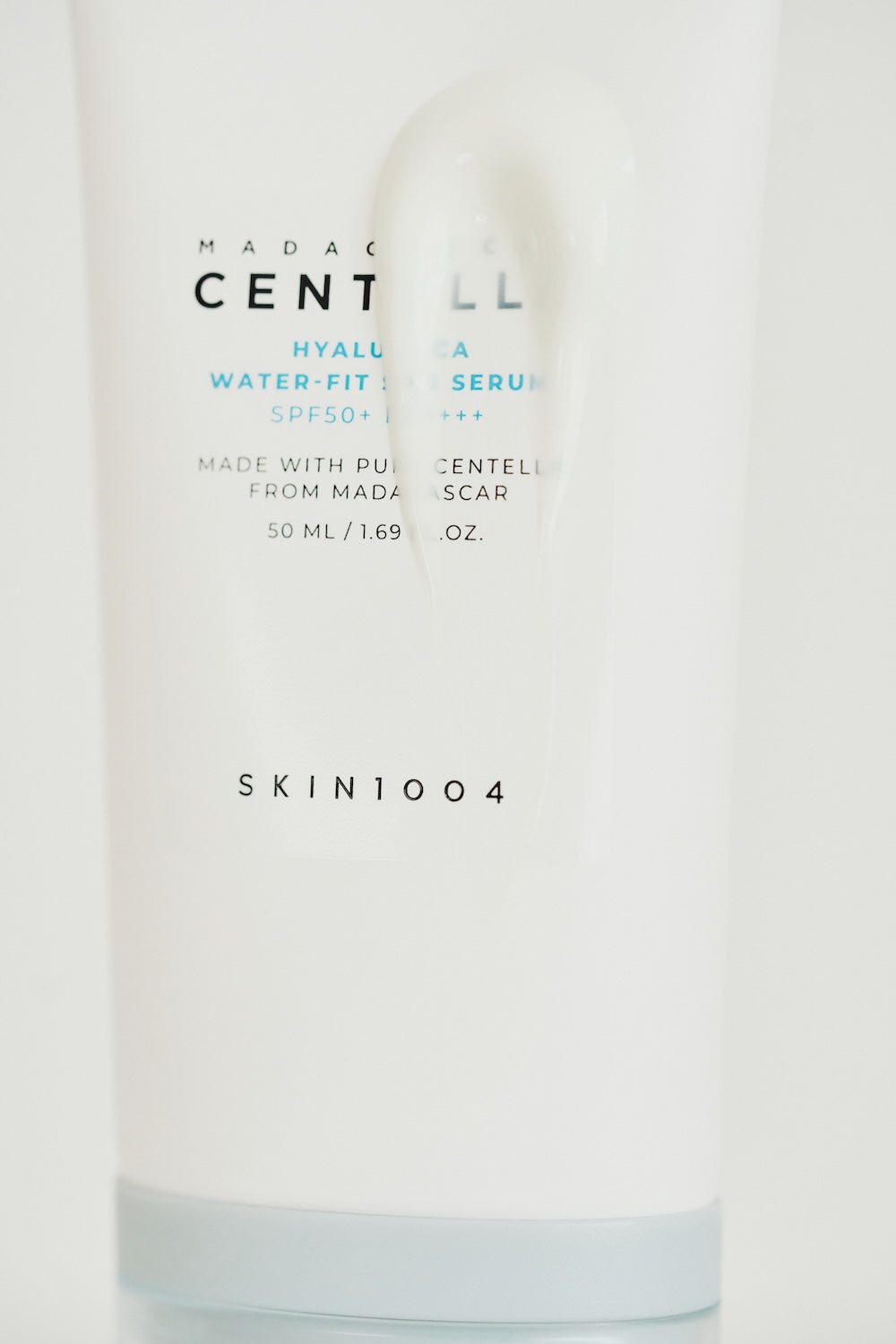 Sun serum box front and bottle side by side
