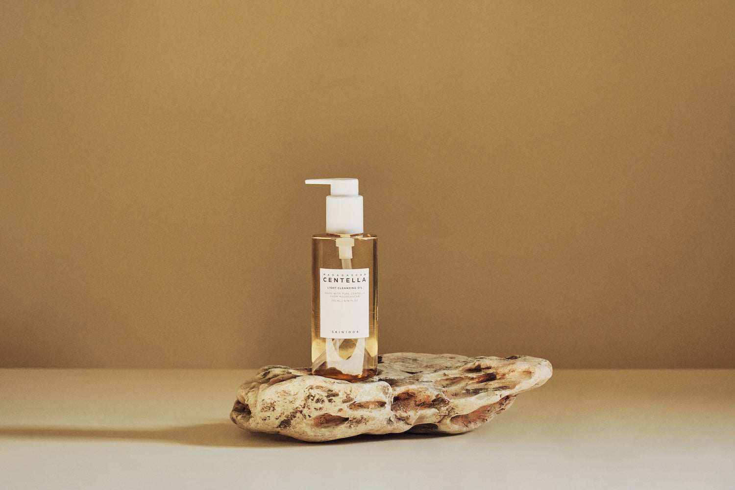 SKIN1004 Light Cleansing Oil placed on a bathroom shelf as the first cleansing step