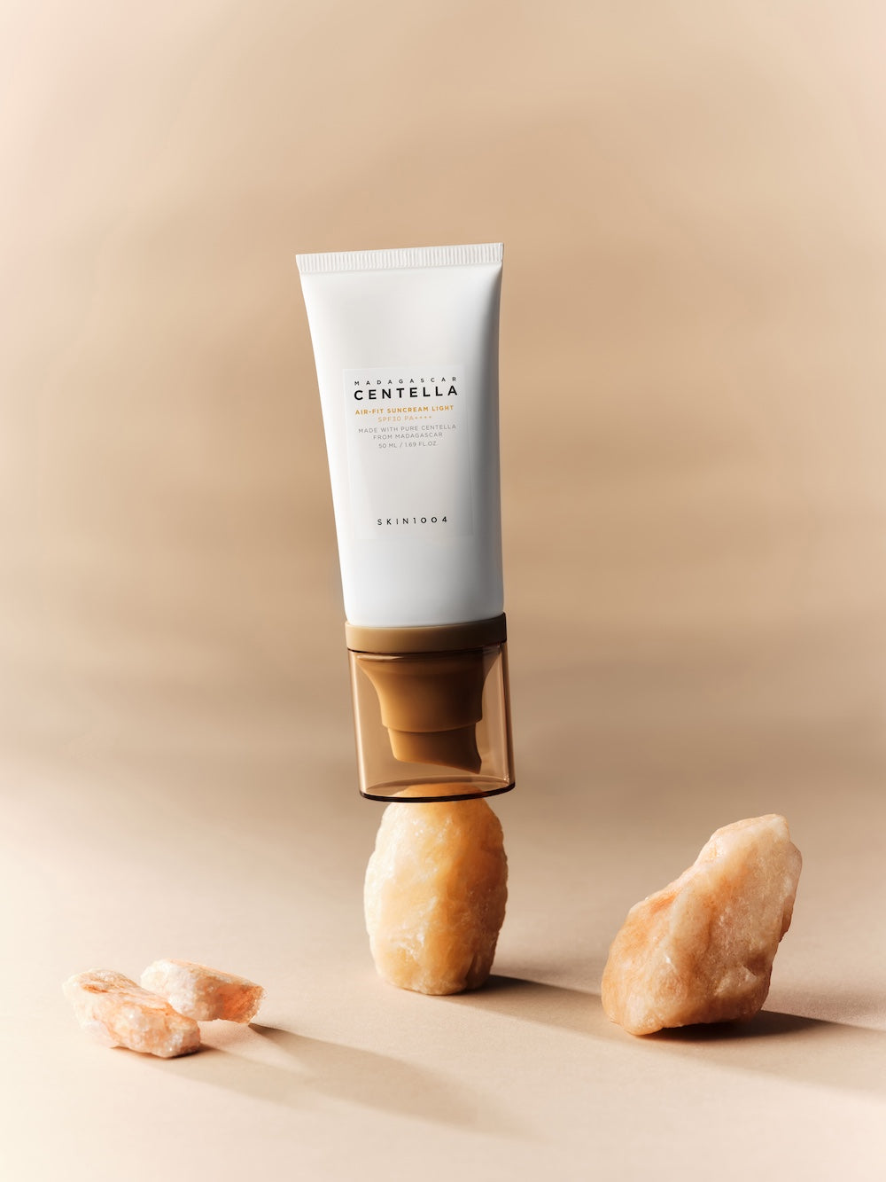 SKIN1004 Air-Fit Suncream Light shown next to its outer packaging box