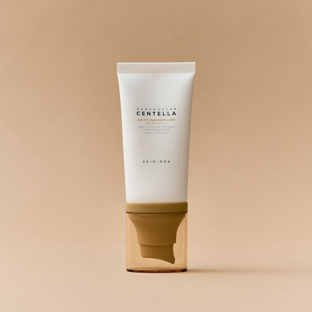 The bottle photographed against a neutral cream background
