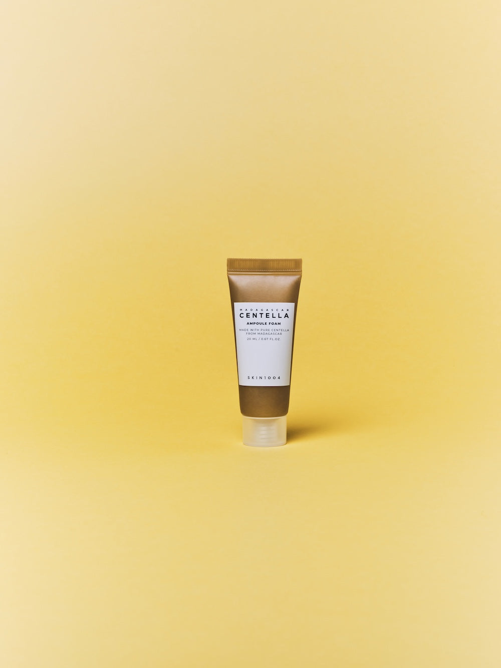 SKIN1004 Madagascar Centella Ampoule Foam tube held at an angle to show the label