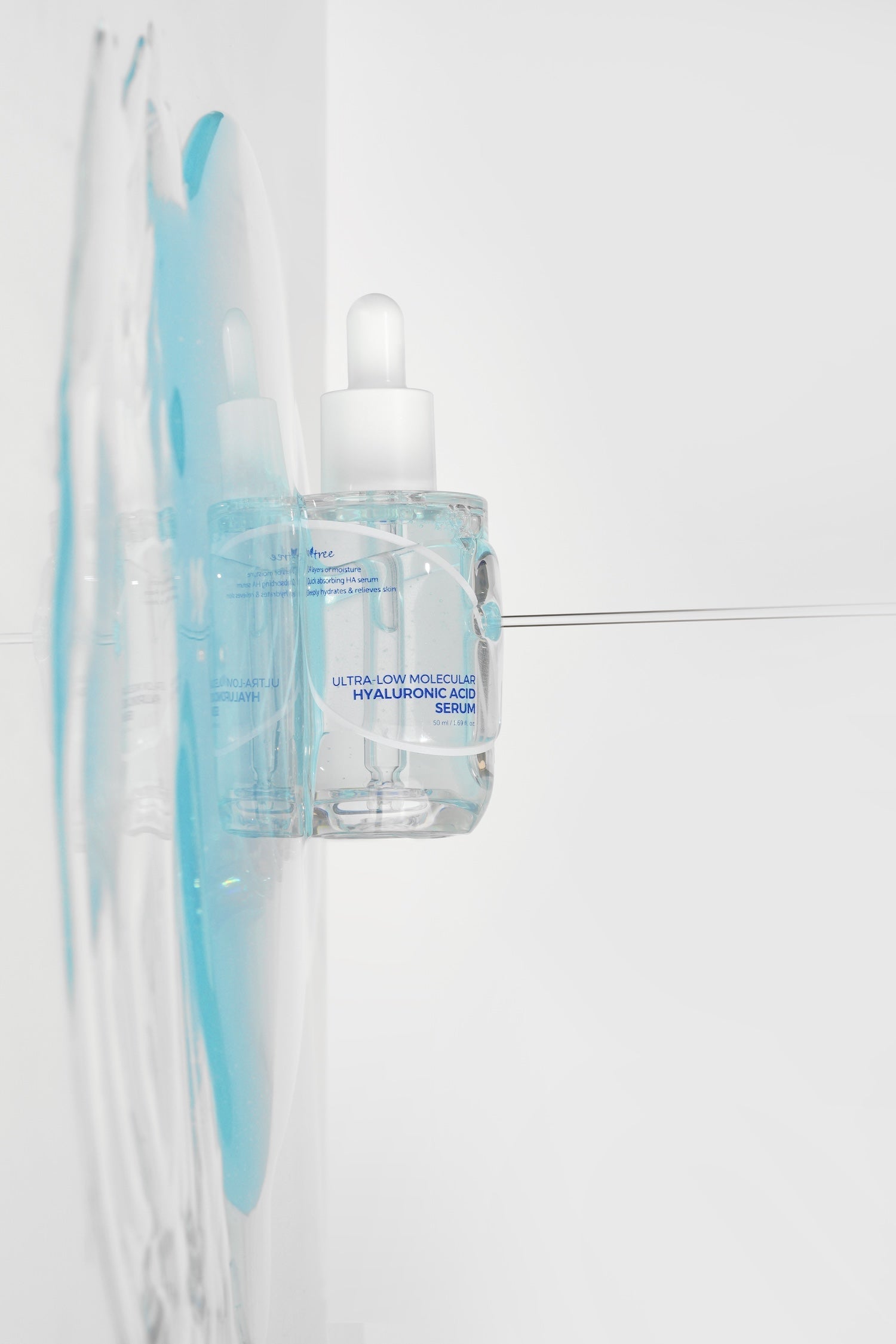 Isntree Ultra Low Molecular Hyaluronic Acid Serum bottle next to packaging box