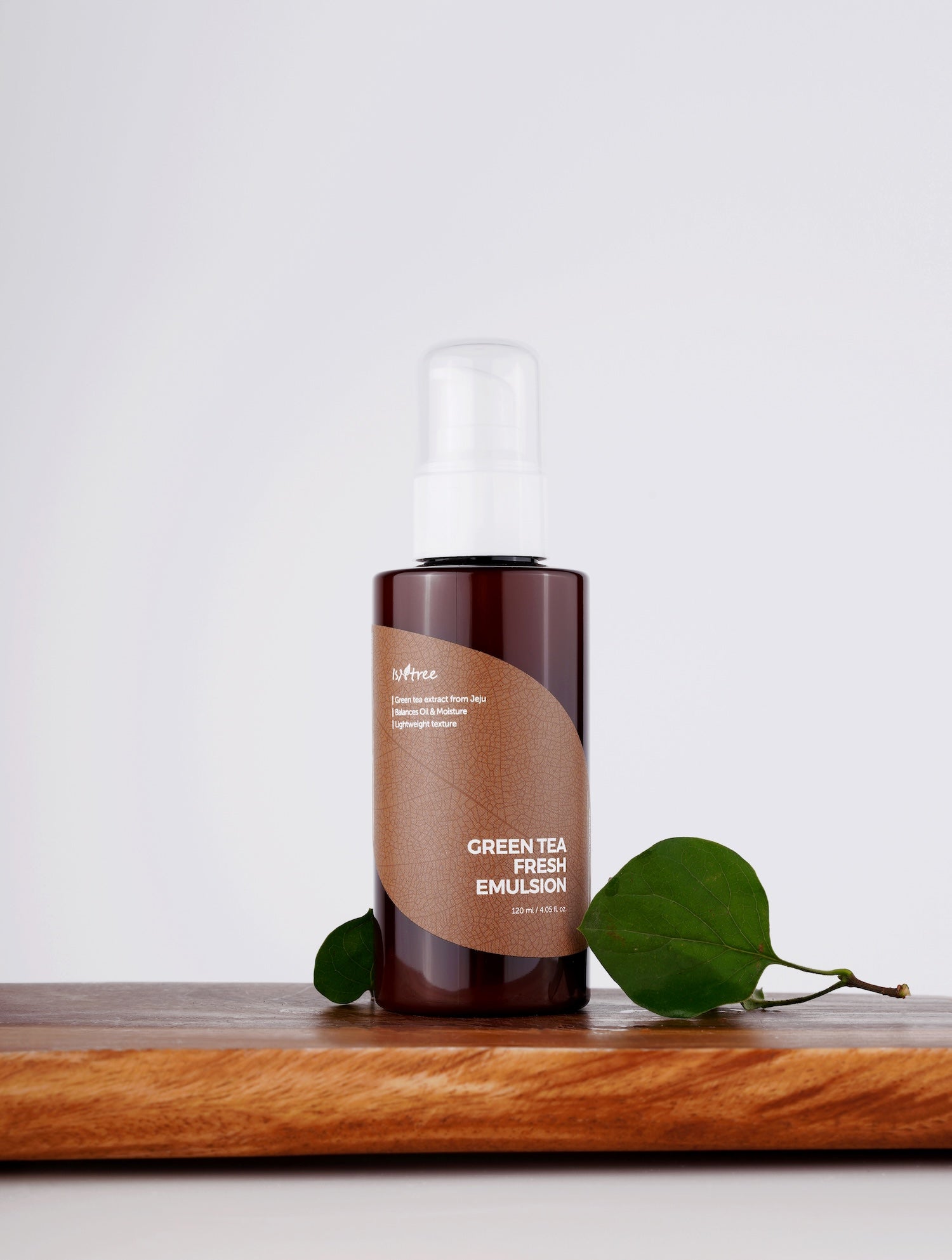Isntree Green Tea Fresh Emulsion applied to cheek during routine