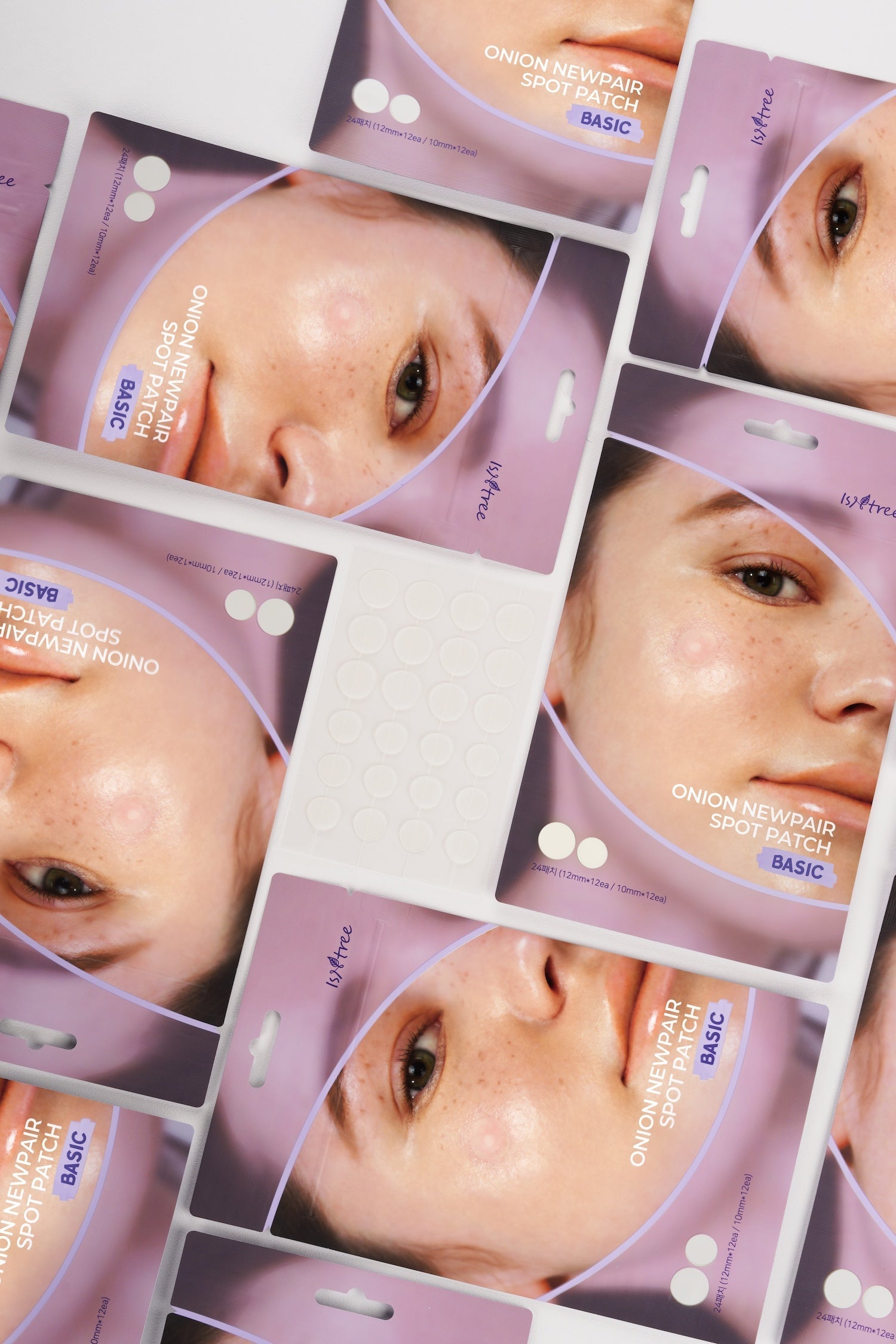 Model applying spot patch during evening skincare routine
