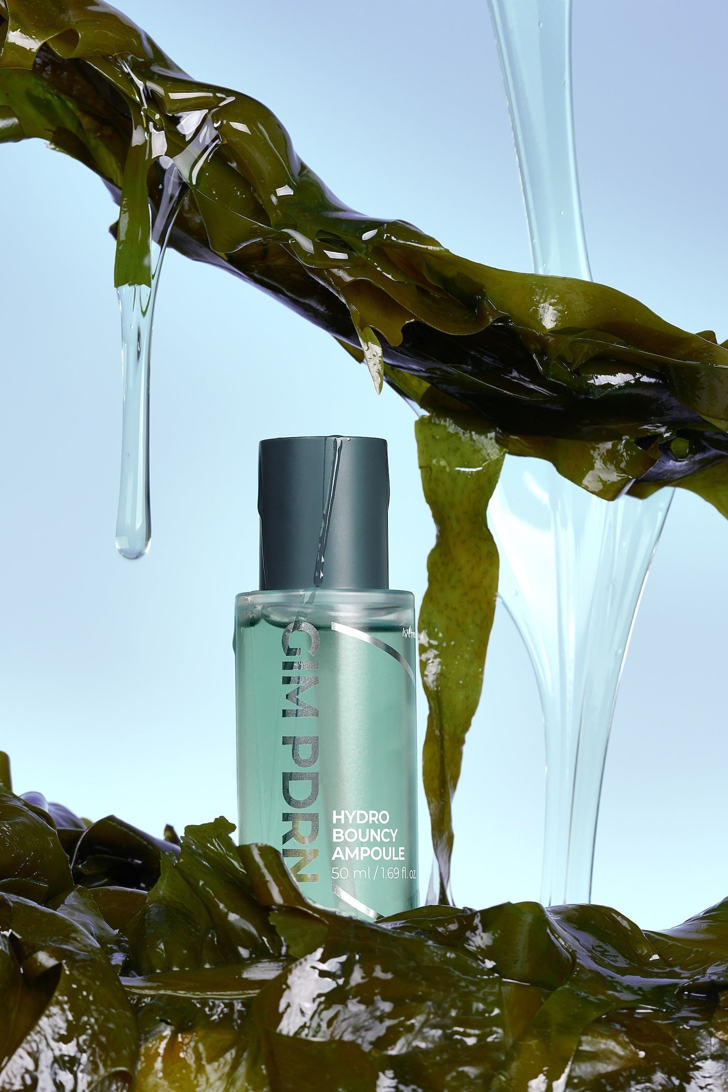 Close up of ampoule texture stretched between fingers