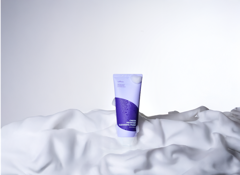 Isntree Onion Cleansing Foam lathered into soft foam with water