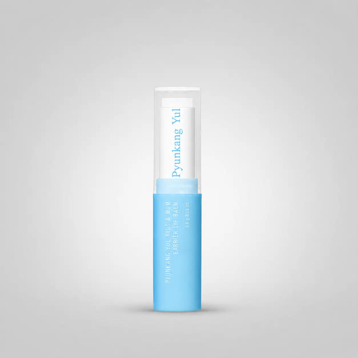 Pyunkang Yul lip balm tube standing upright against a plain background